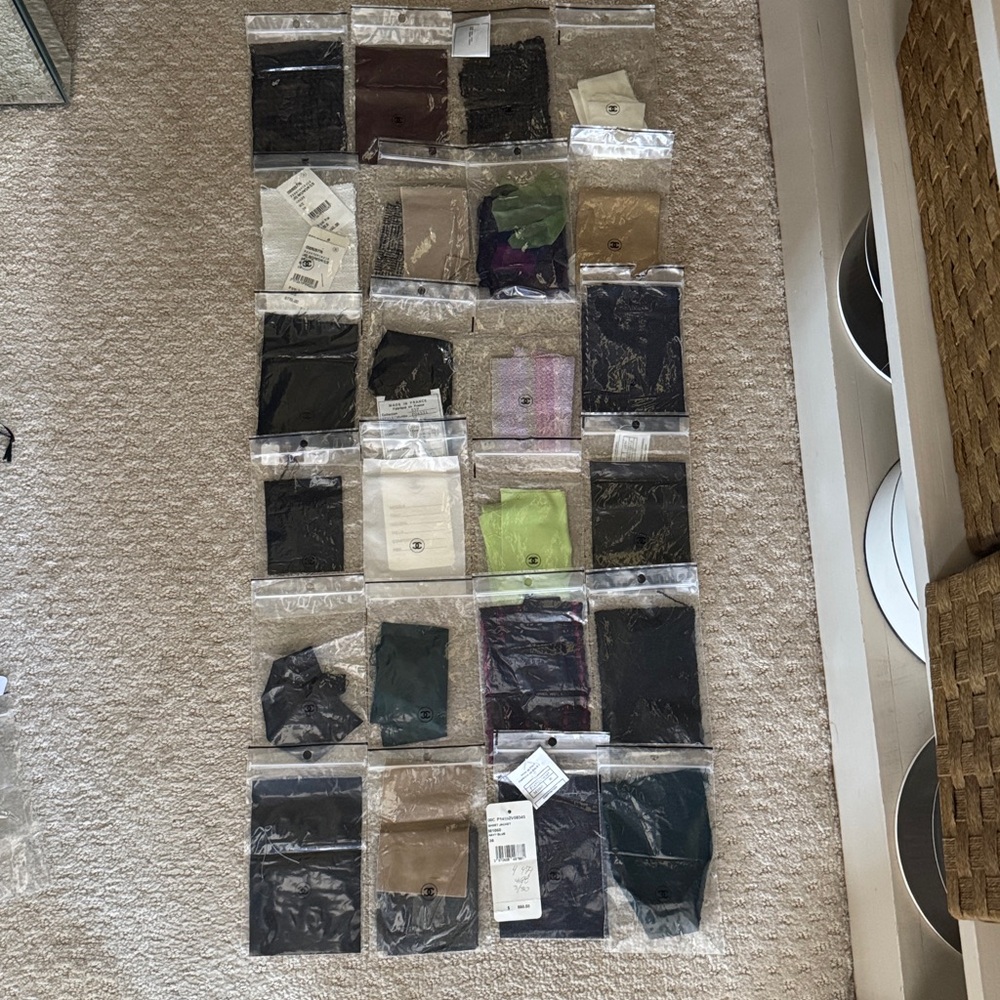 24 CHANEL bags and fabric swatches